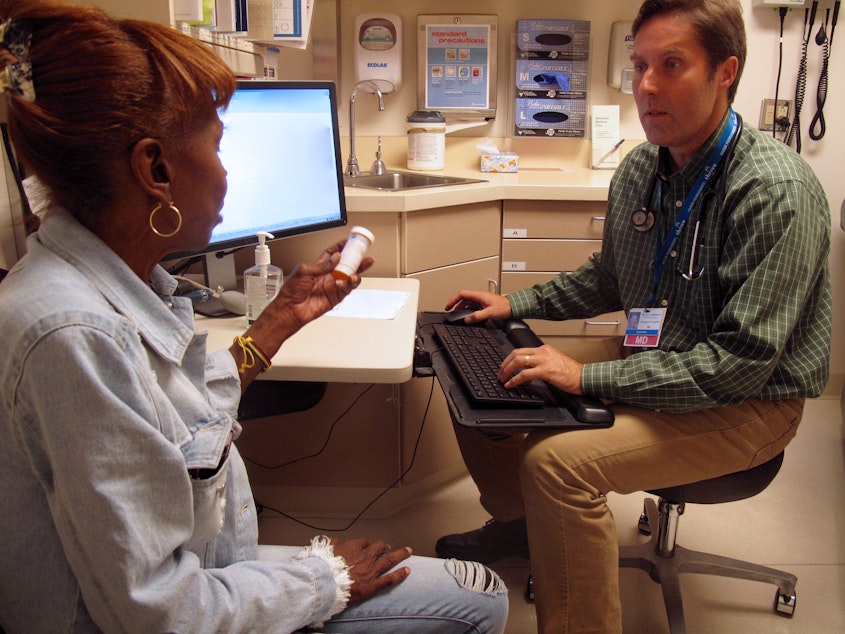 caption: Linda Hargrove discusses using Suboxone with her doctor Grant Scull during an appointment.