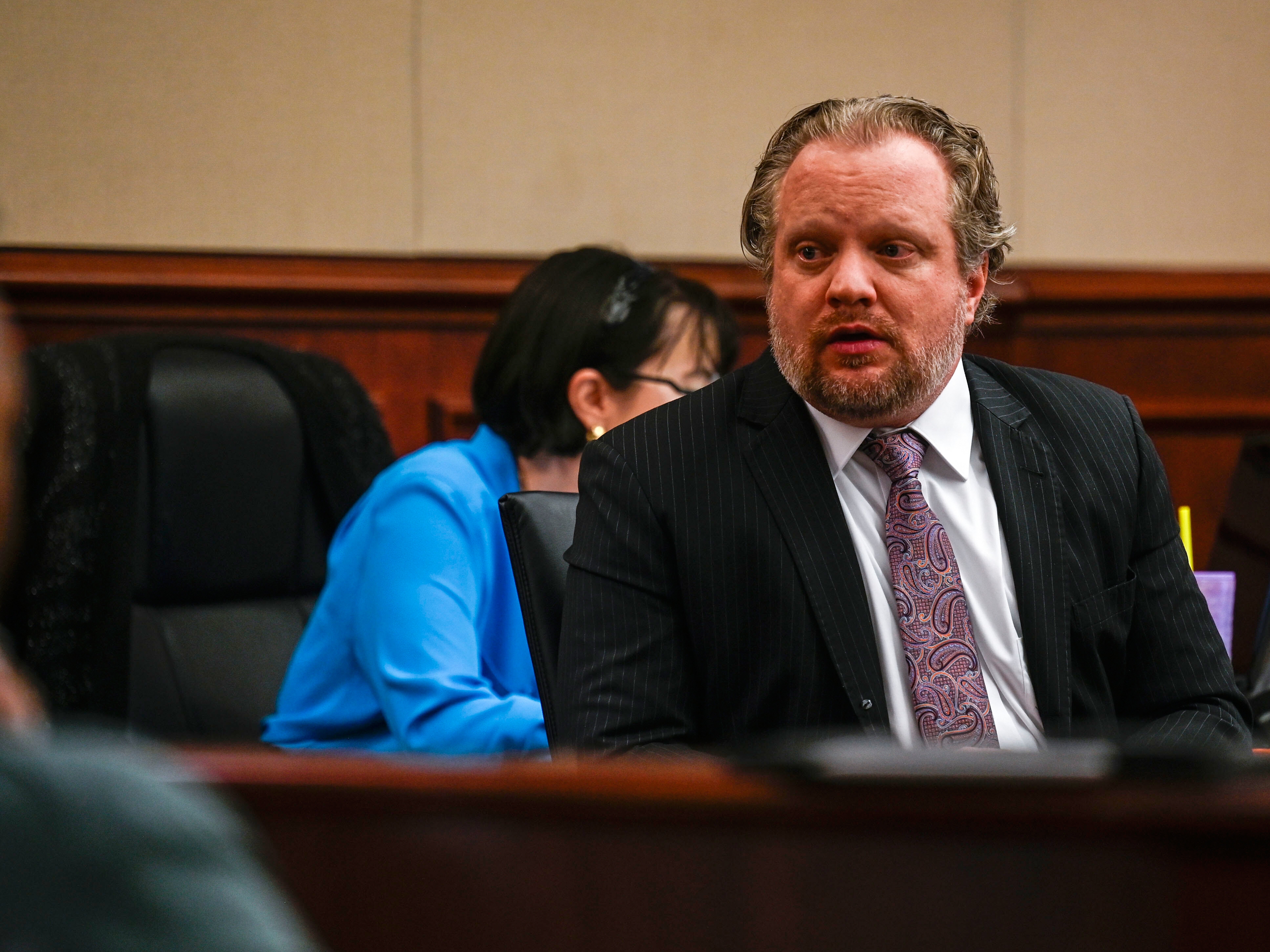 caption: James Craig is accused of murdering his wife, Angela. His trial began at the Arapahoe District Court in Centennial, Colo., on Tuesday.