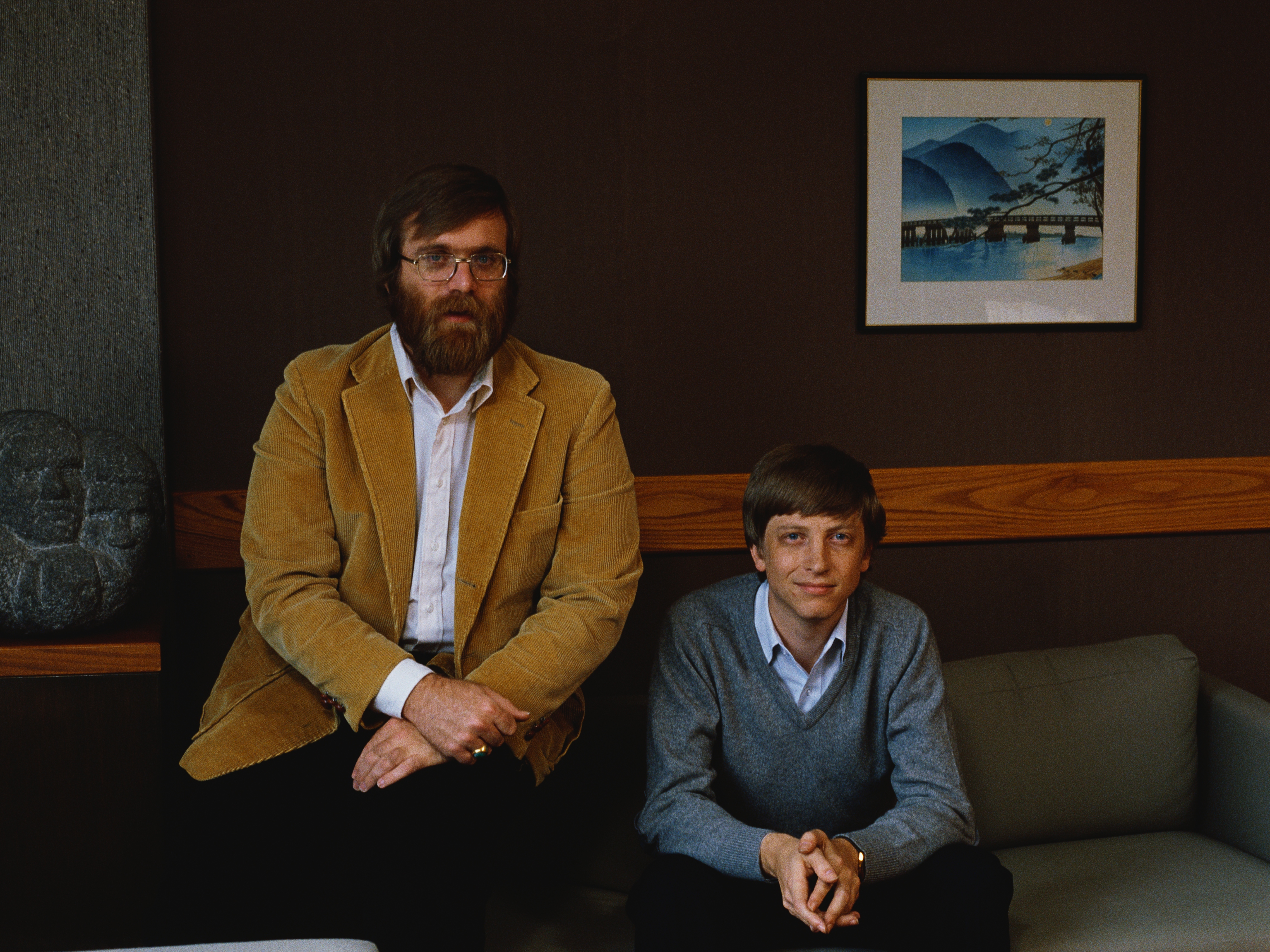 caption: Microsoft Co-founders Bill Gates and Paul Allen pose for a portrait in 1984 in Seattle, Washington.