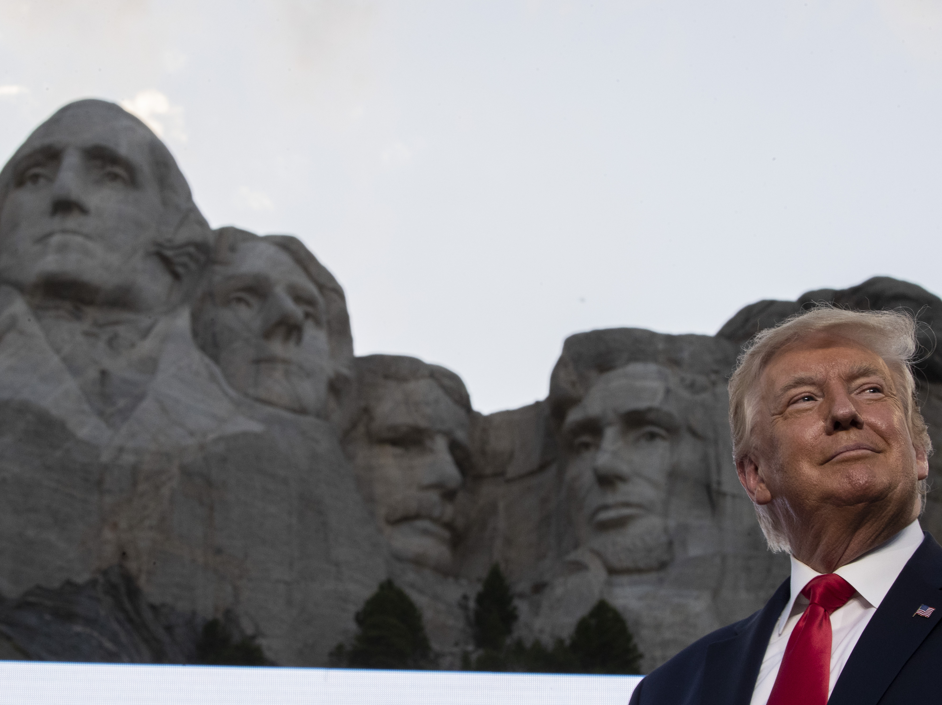 caption: President Trump had little to say about the coronavirus during remarks Friday at Mount Rushmore National Memorial, near Keystone, S.D.