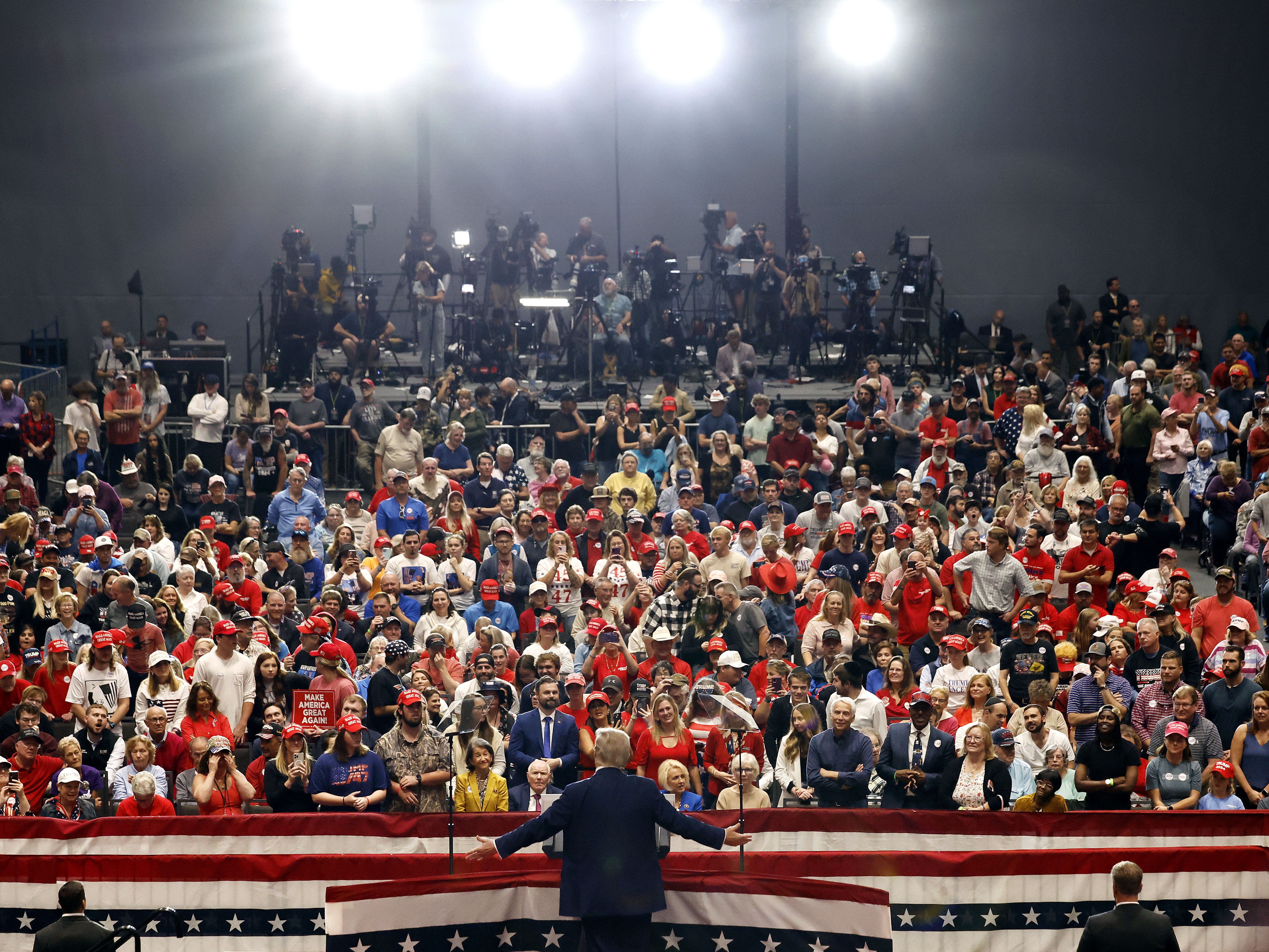 caption: President Trump speaks during a campaign event on Oct. 30, 2024 in Rocky Mount, North Carolina. He plans to return to the city on Friday.