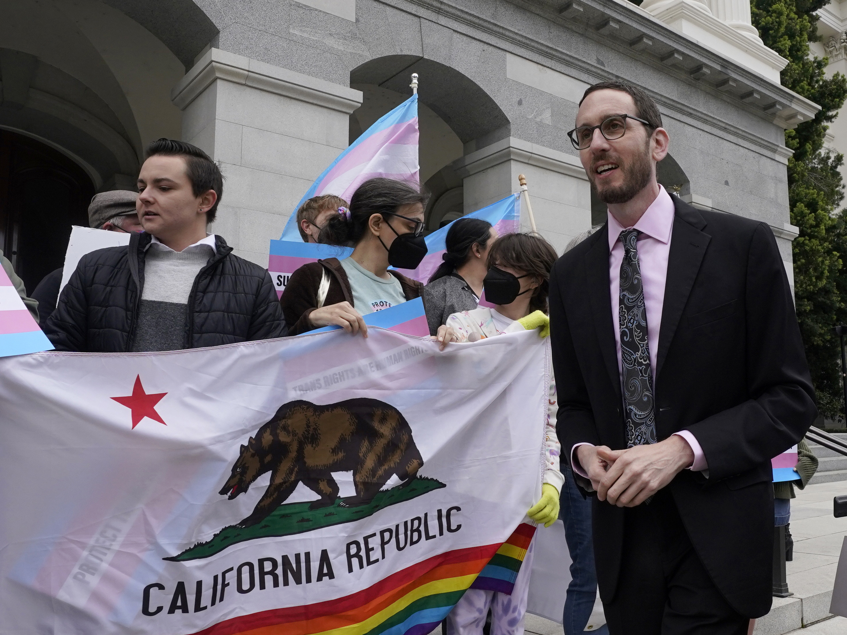 caption: State Sen. Scott Wiener, D-San Francisco is shown ahead of a news conference in Sacramento, Calif., last month. San Francisco is repealing a ban on city-funded travel to 30 states that it says restrict abortion, voting and LGBTQ rights after determining the boycott is doing more harm than good. Wiener, who authored the original ban, agreed that the measure hadn't produced the intended results.