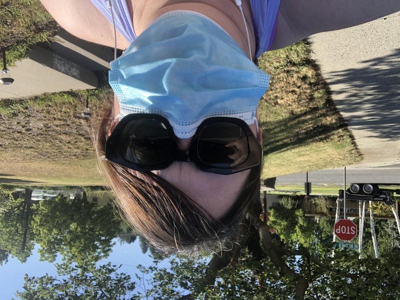 caption: Anna King keeps walking every day to gain more strength and endurance. Before COVID-19, she was walking five miles quickly on her lunch breaks.