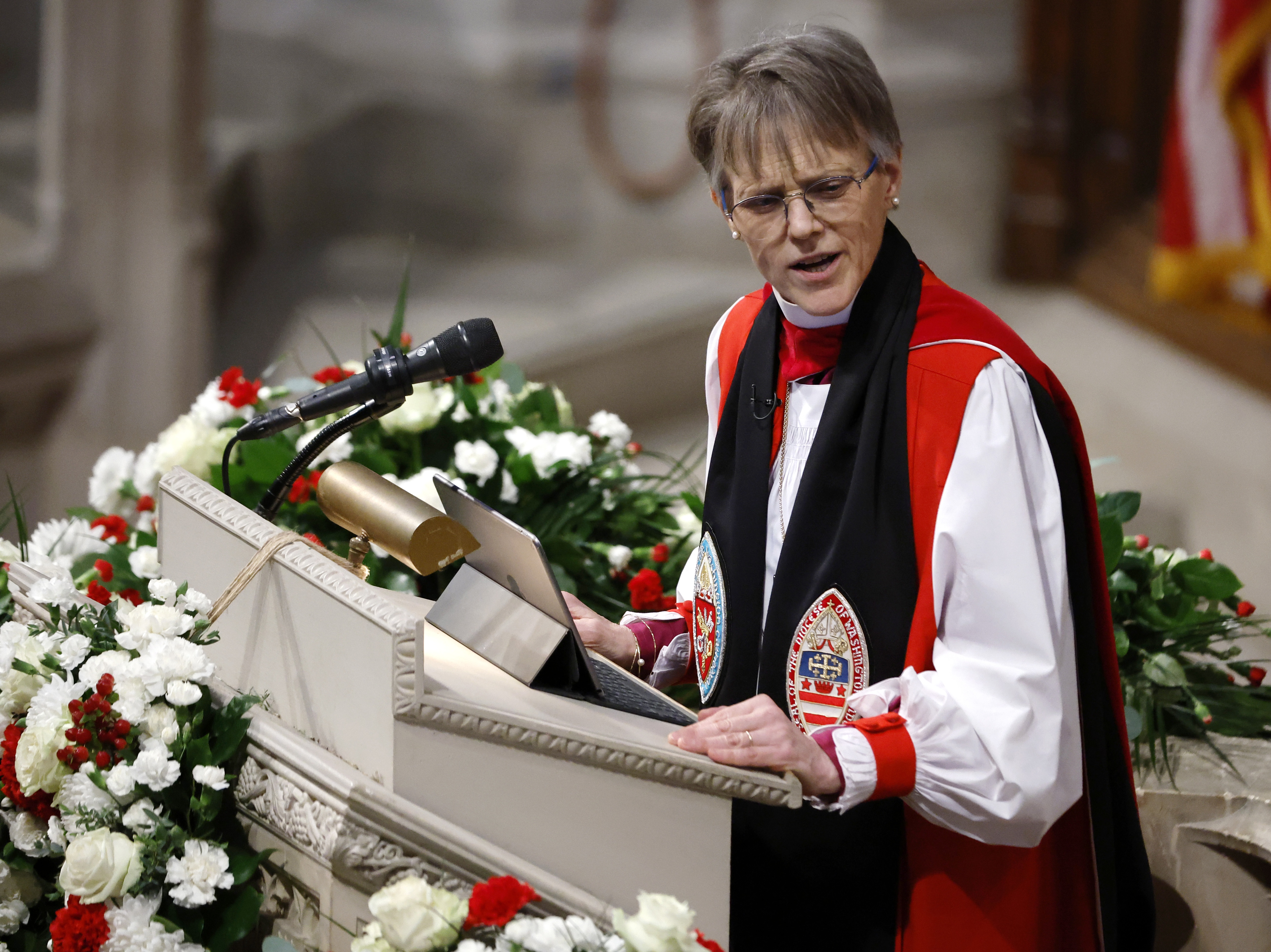 caption: Bishop Mariann Edgar Budde delivering a sermon in which she directly confronted President Trump during the National Prayer Service at Washington National Cathedral in January.