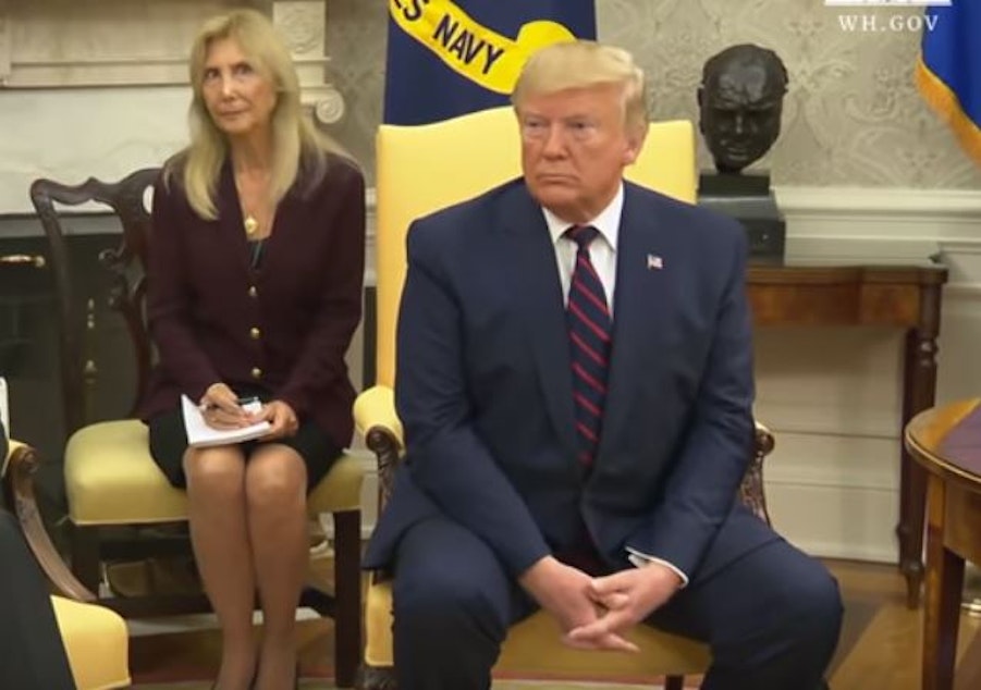 caption: President Donald Trump speaks with the president of Italy in an open press event. The interpreter's expressions as Trump spoke went viral on social media.