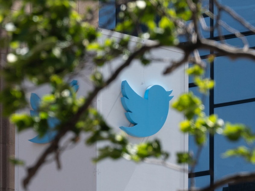 caption: The Twitter logo is seen at their headquarters in San Francisco. The company say it's testing out an edit button, which is its most-requested feature.
