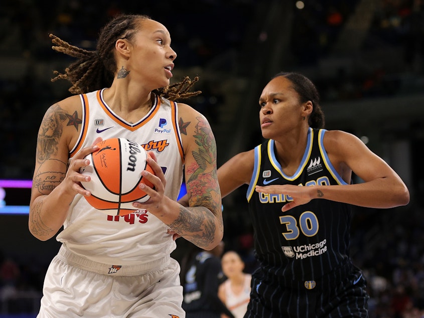 caption: Brittney Griner (left) of the Phoenix Mercury is defended by Azurá Stevens of the Chicago Sky during Game 4 of the WNBA Finals at Wintrust Arena in Chicago, Illinois, on Oct. 17, 2021.