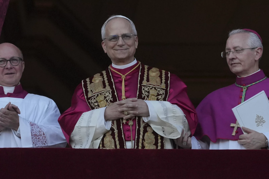 caption: Newly elected Pope Leone XIV appears at the balcony of St. Peter's Basilica at the Vatican, Thursday, May 8, 2025.