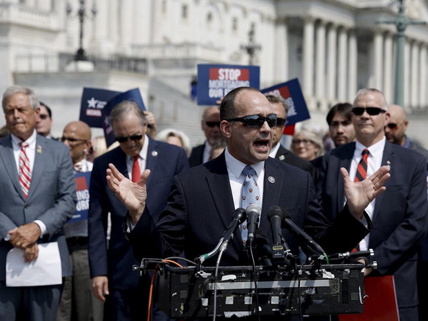 caption: Rep. Bob Good, R-Va., speaks at a news conference outside the U.S. Capitol on July 25.