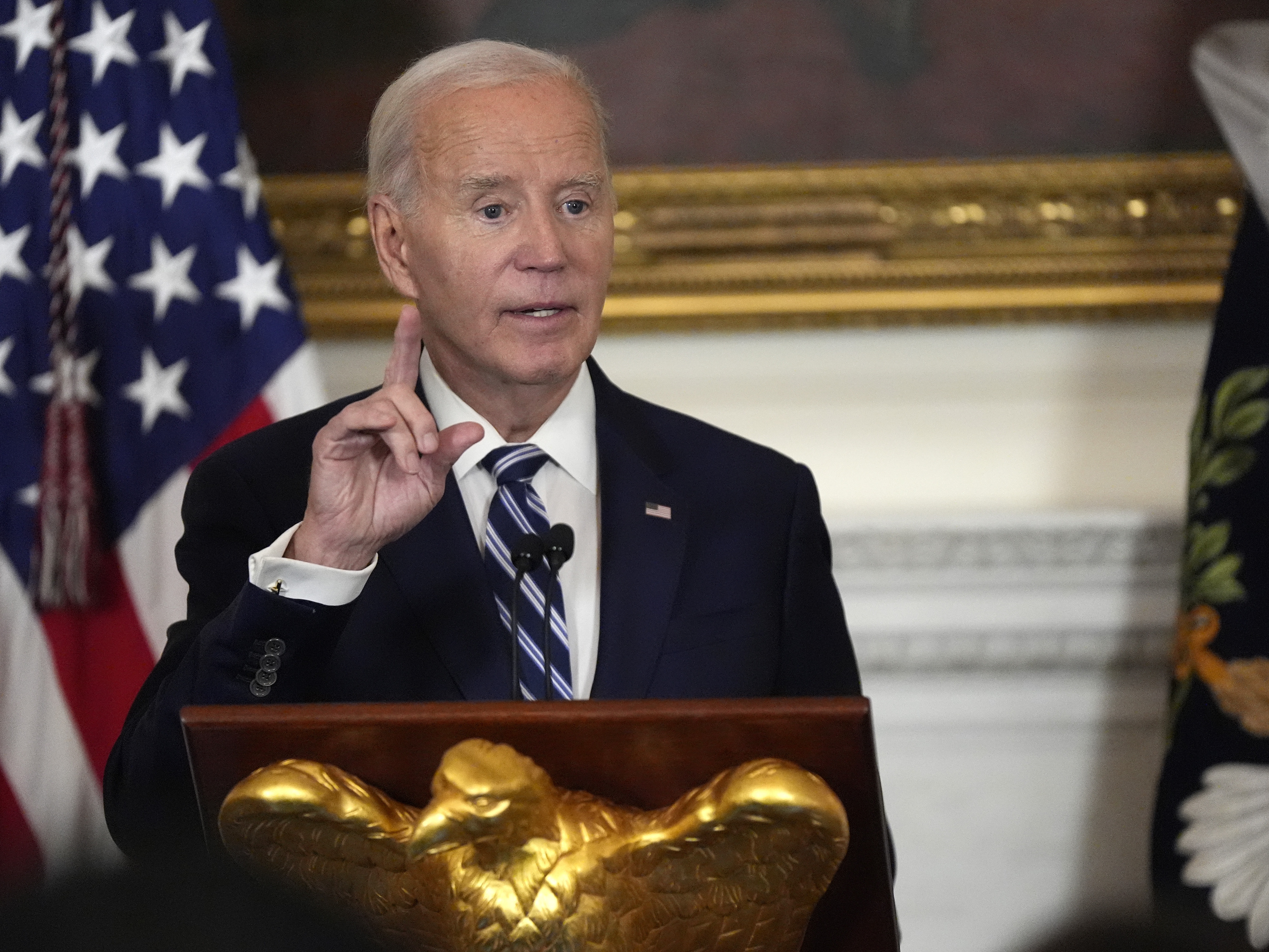 caption: President Joe Biden speaks at a reception for new Democratic members of Congress in the State Dining Room of the White House, Sunday, Jan. 5, 2025, in Washington.