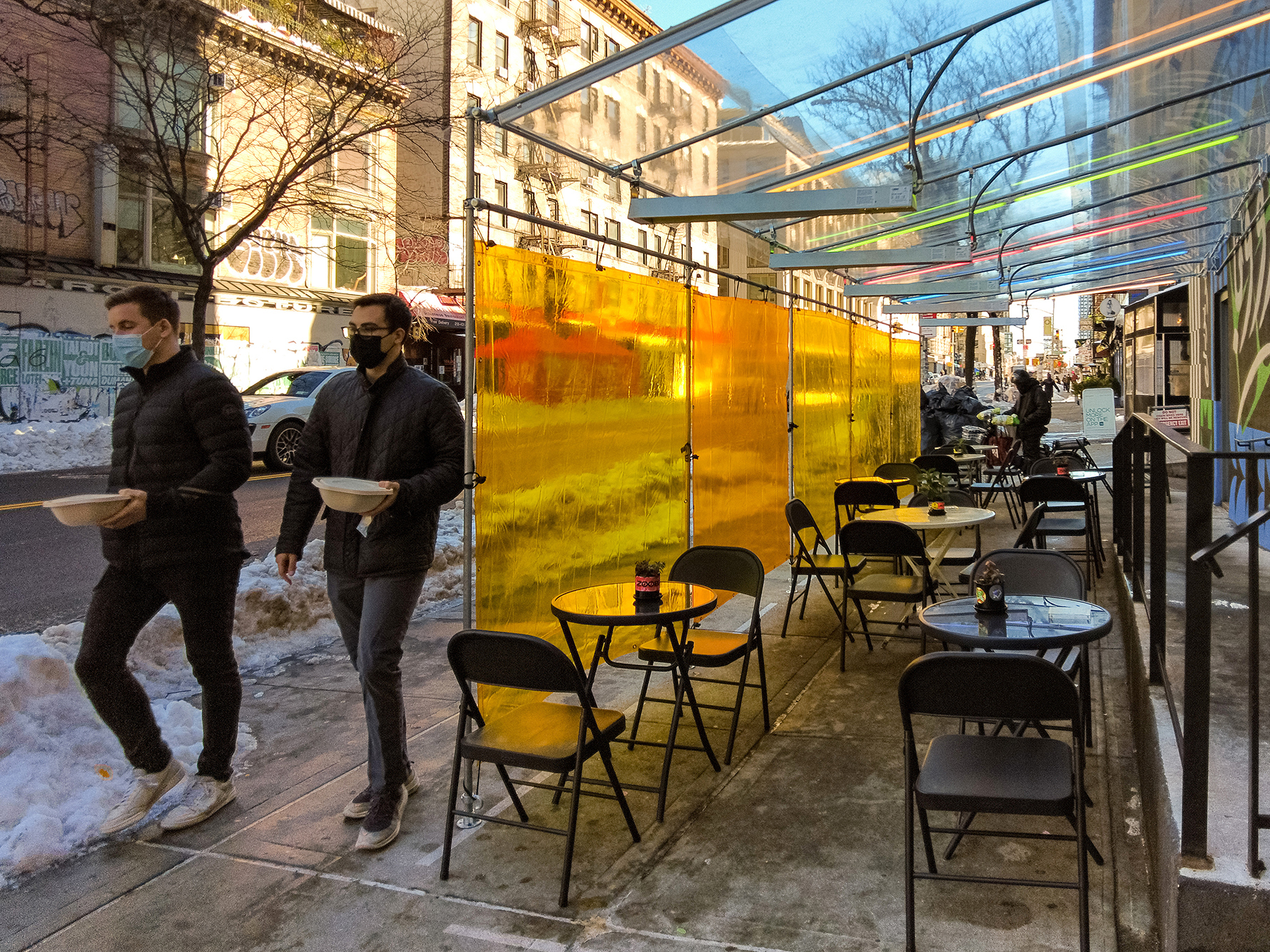 caption: Restrictions on public gatherings and indoor dining, as well as improved rates of mask-wearing and social distancing helped bring down the rate of new coronavirus infections in the U.S.