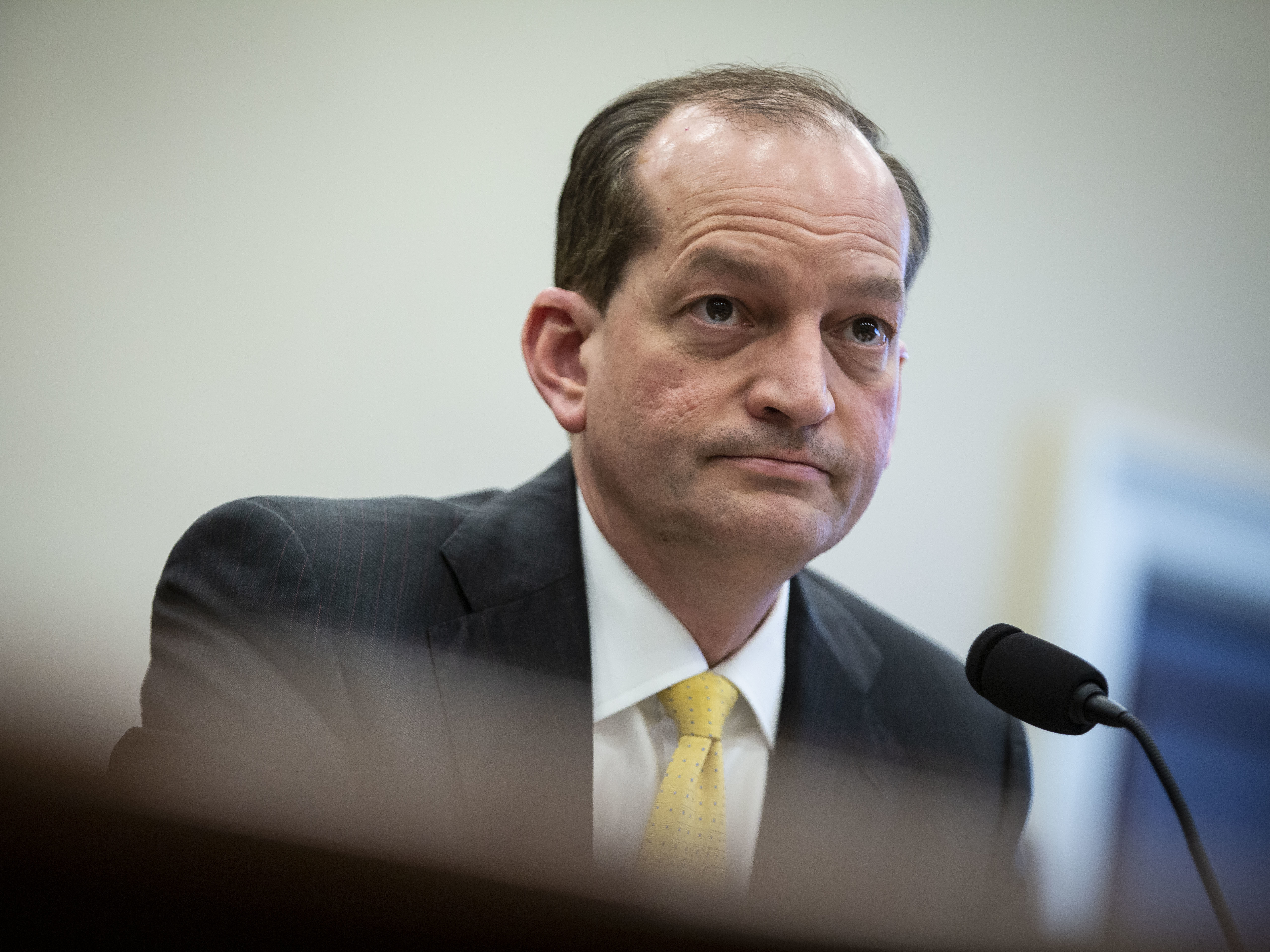 caption: Labor Secretary Alexander Acosta testifies during a House Appropriations Committee hearing on April 3.