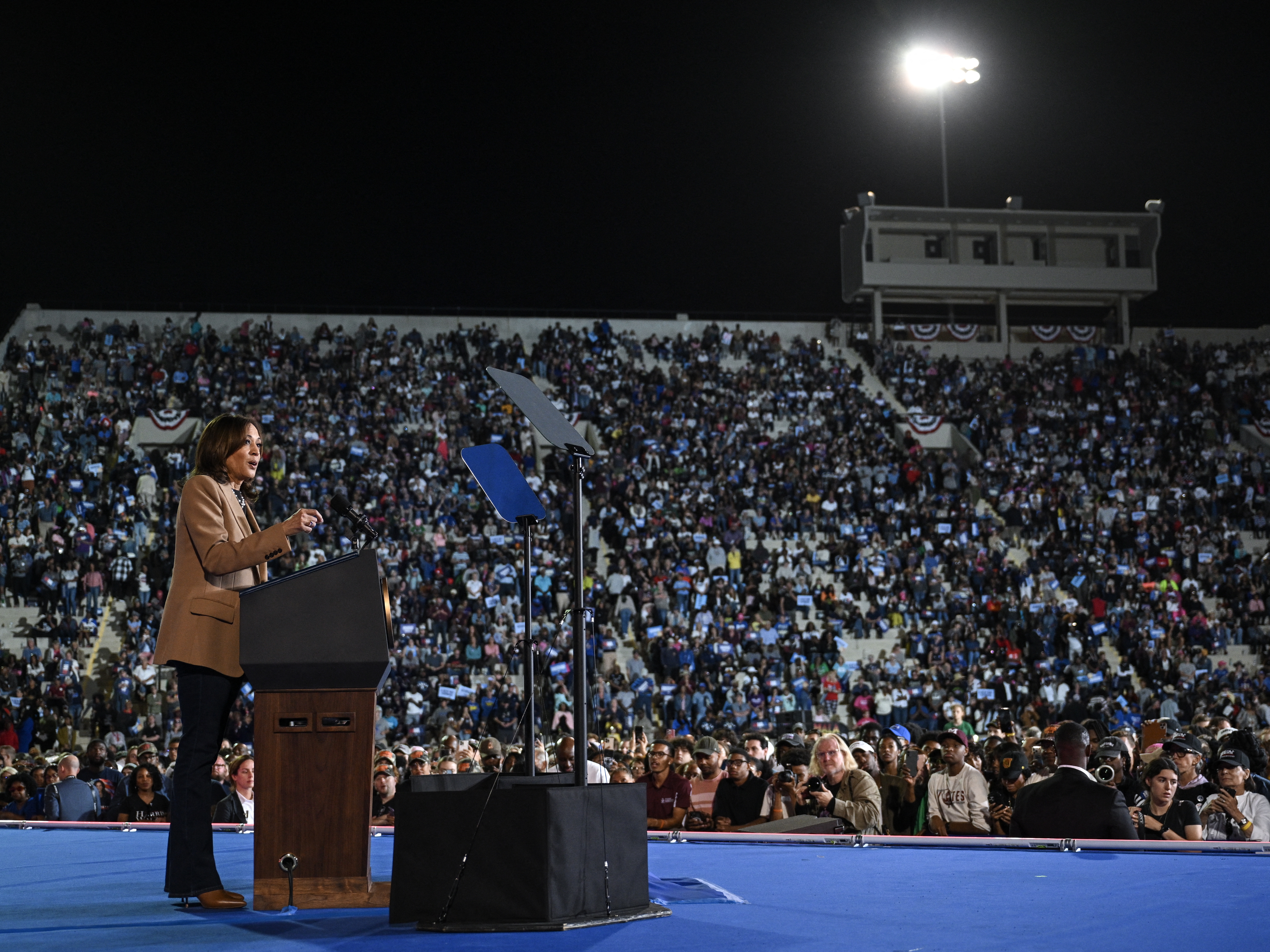 caption: Vice President Harris speaks during a campaign rally in Georgia on Thursday. On Friday, she travels to Houston for a rally with Beyoncé.