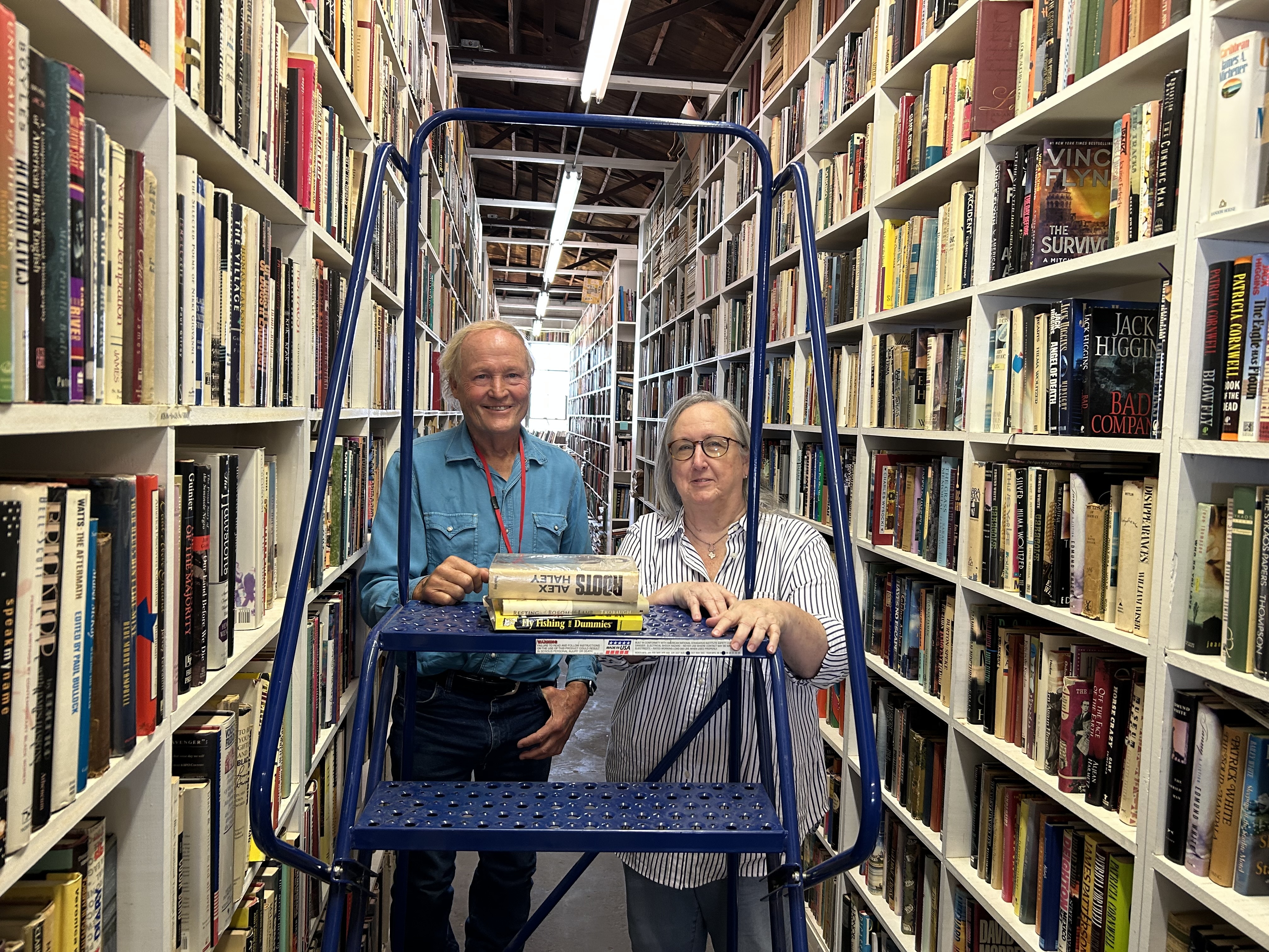 caption: George Getschow (left,) executive director of the literary center, and Kathy Floyd, the center's manager. "I've never known anyone who loved books as much as Larry McMurtry," says Getschow. 