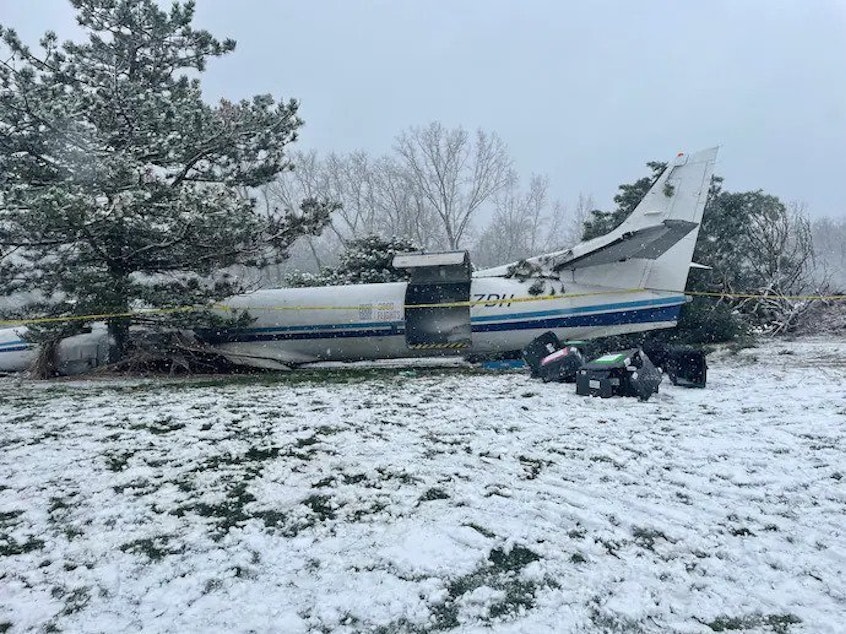 caption: A twin engine turboprop airplane crashed onto the green of the Western Lakes Golf Club in Pewaukee, Wis. Tuesday morning.