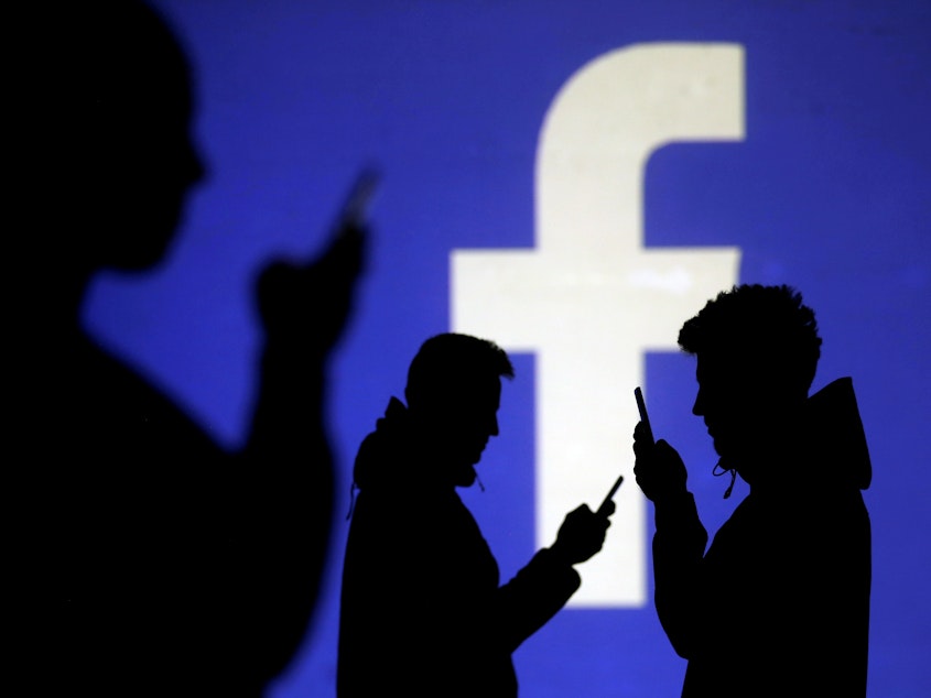 caption: Facebook has been using artificial intelligence to detect if a user might be about engage in self-harm. The same technology may soon be used in other scenarios.