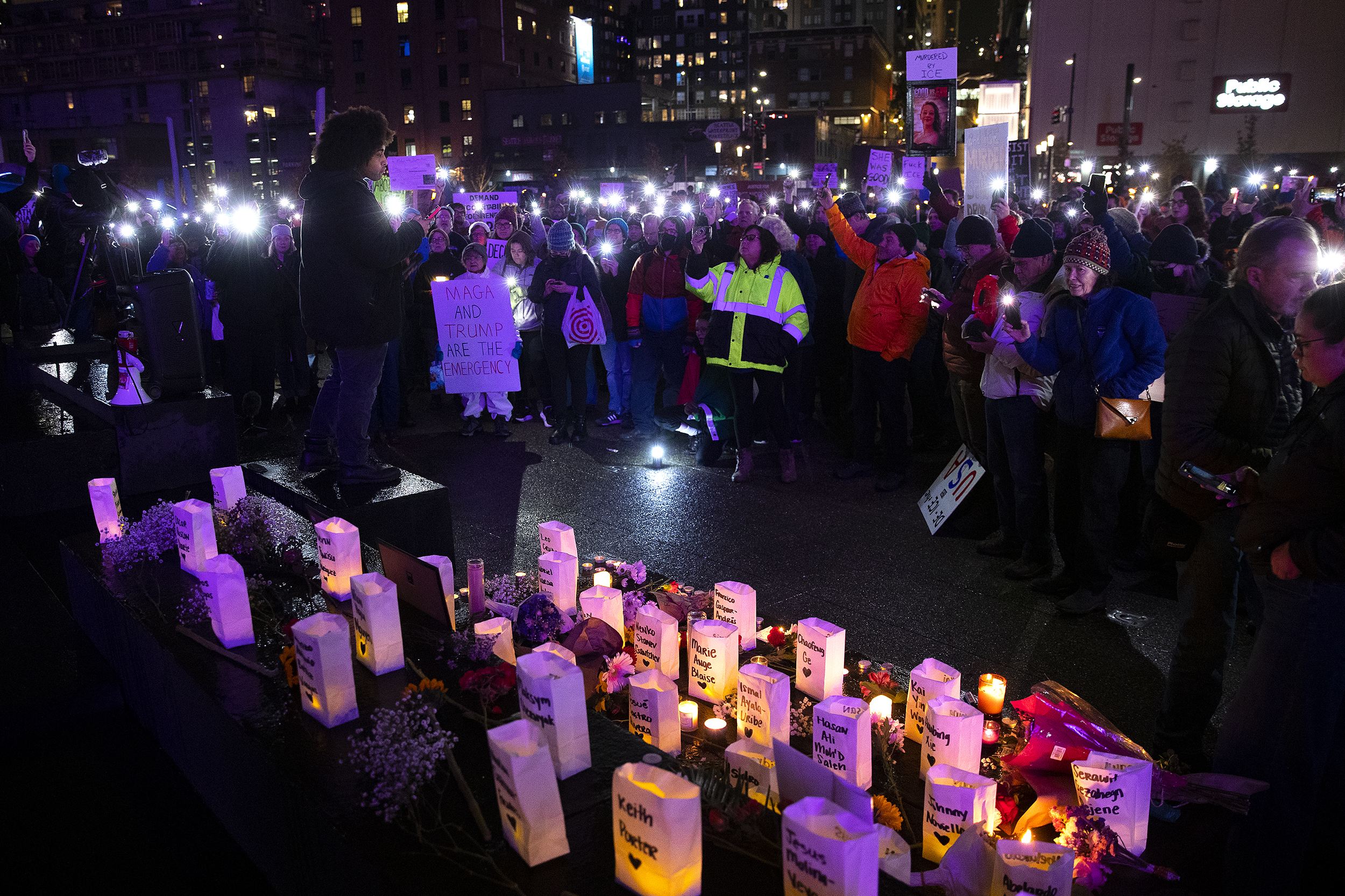 caption: Cameron Lavi-Jones, with local band King Youngblood, speaks to a crowd of hundreds during a vigil honoring Renee Nicole Good on Thursday, January 8, 2026, at Pier 58 in Seattle. 