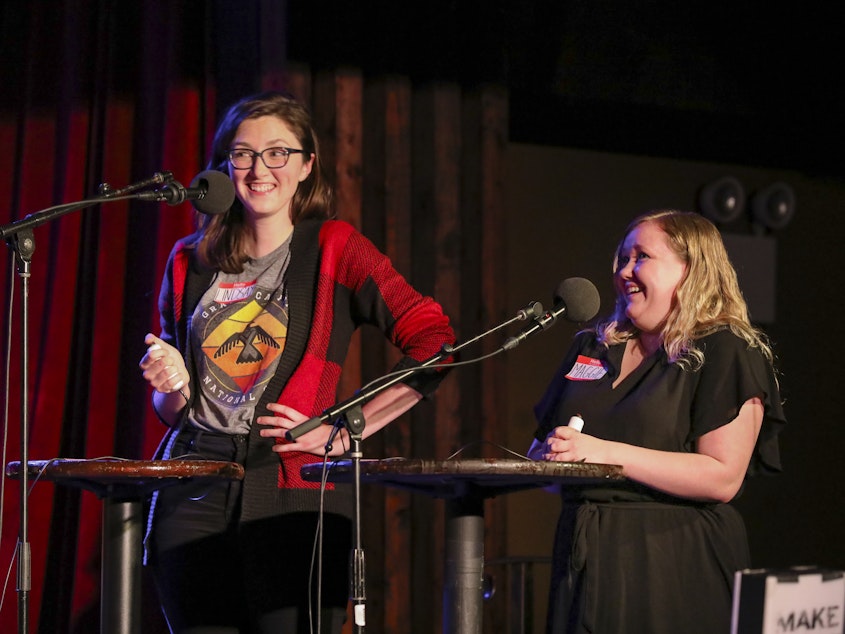 caption: Contestants Lindsay Thompson and Maggie Probst Bussard face off in games on <em>Ask Me Another</em> at the Bell House in Brooklyn, New York.