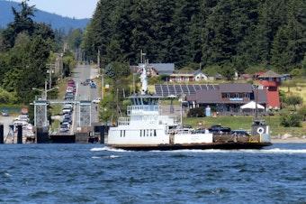 caption: Ferry systems serving San Juan, Skagit and Whatcom counties are looking for funding options to solve service challenges; over-budget bids have temporarily stalled the planned all-electric replacement of the aging ferry between Anacortes and Guemes Island.