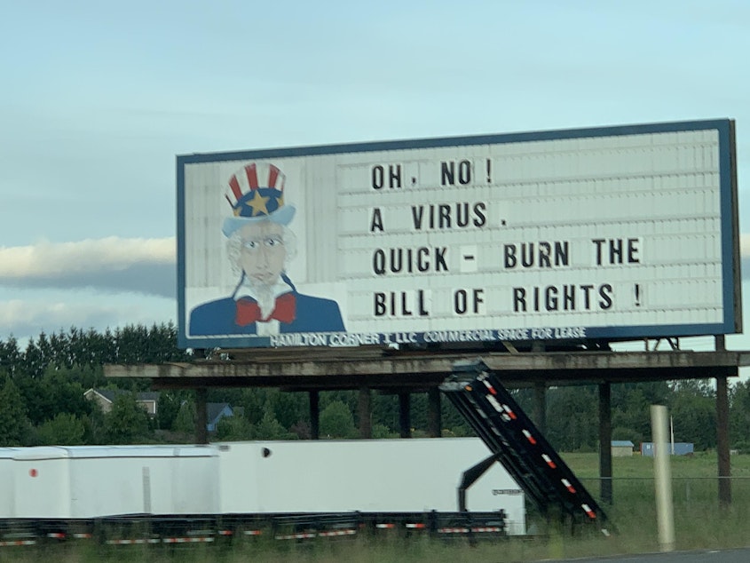 caption: This privately owned "Uncle Sam" billboard along I-5 in Lewis County has for decades been a message board for provocative conservative messages. Recently, it's become the subject of a petition to have it taken down.