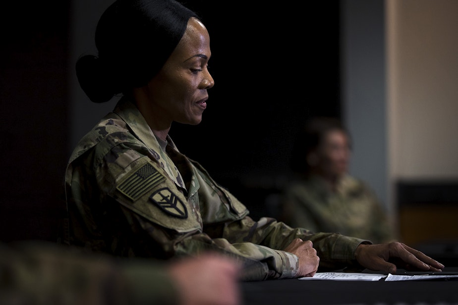 caption: Col. Hope Williamson-Younce, Commander of the 627th Hospital Center in Fort Carson, Colorado, attends a press conference at the 250-bed military field hospital for non COVID-19 patients deployed at the CenturyLink Field Event Center on Sunday, April 5, 2020, in Seattle.
