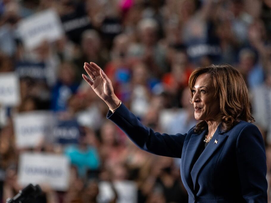 caption: Democratic presidential candidate and Vice President Harris speaks to supporters during a campaign rally at West Allis Central High School on Tuesday in West Allis, Wis.