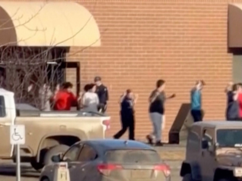 caption: This grab from video shows students exiting the Tumbler Ridge school after deadly shootings, in British Columbia, Canada, Tuesday Feb. 10, 2026.