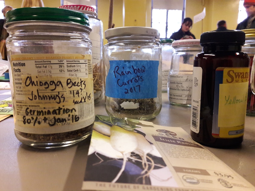 caption: Dozens of local gardeners gathered for King County Seed Lending Library's annual seed swap at Phinney Center.