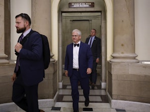 caption: House speaker pro tempore Patrick McHenry (center) walks out of the offices of former Speaker of the House Kevin McCarthy on Wednesday. The process is underway to replace McCarthy after he was ousted from the speakership on Tuesday.