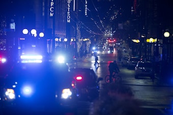 caption: Patrol cars and ambulances are shown at the intersection of Third Avenue and Pine Street on Wednesday, Jan. 22, 2020.
