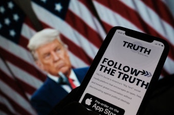 caption: Former President Donald Trump on Wednesday announced plans  to launch his own social networking platform called TRUTH Social, which is expected to begin its beta launch for "invited guests" next month.