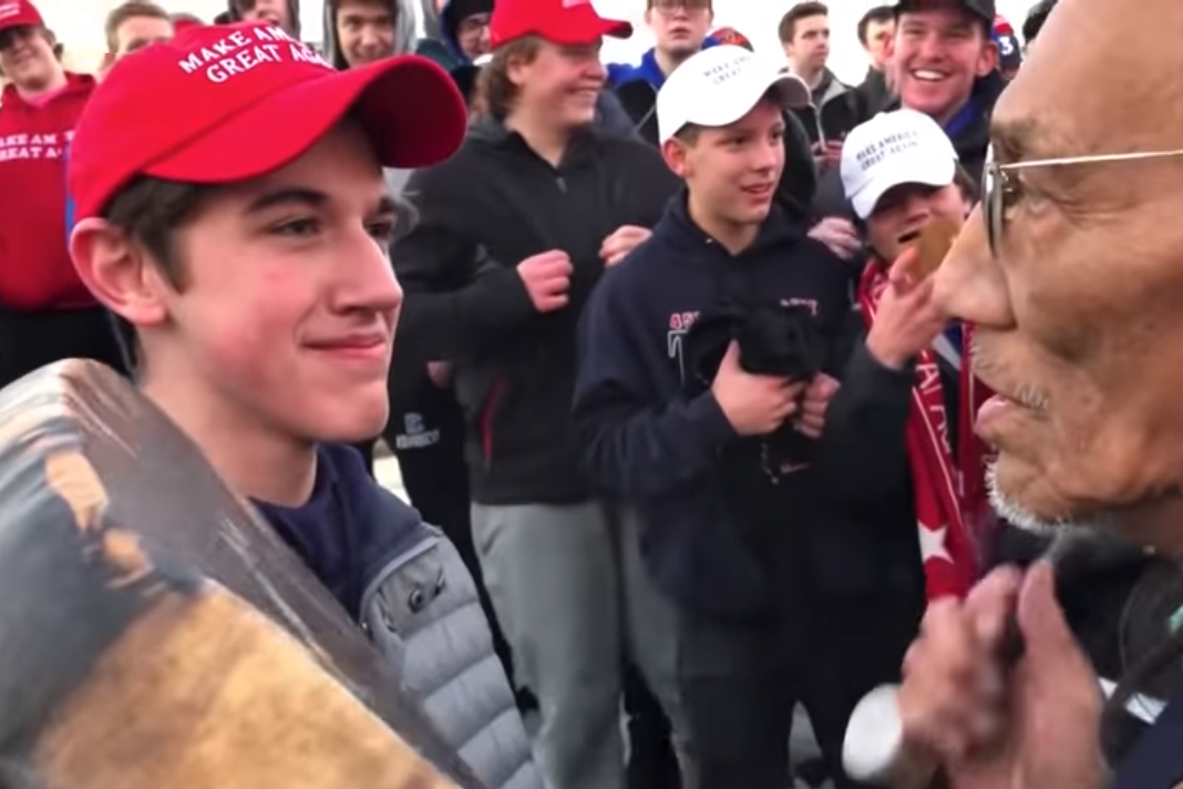 caption: (YouTube Screenshot via On Native Ground)