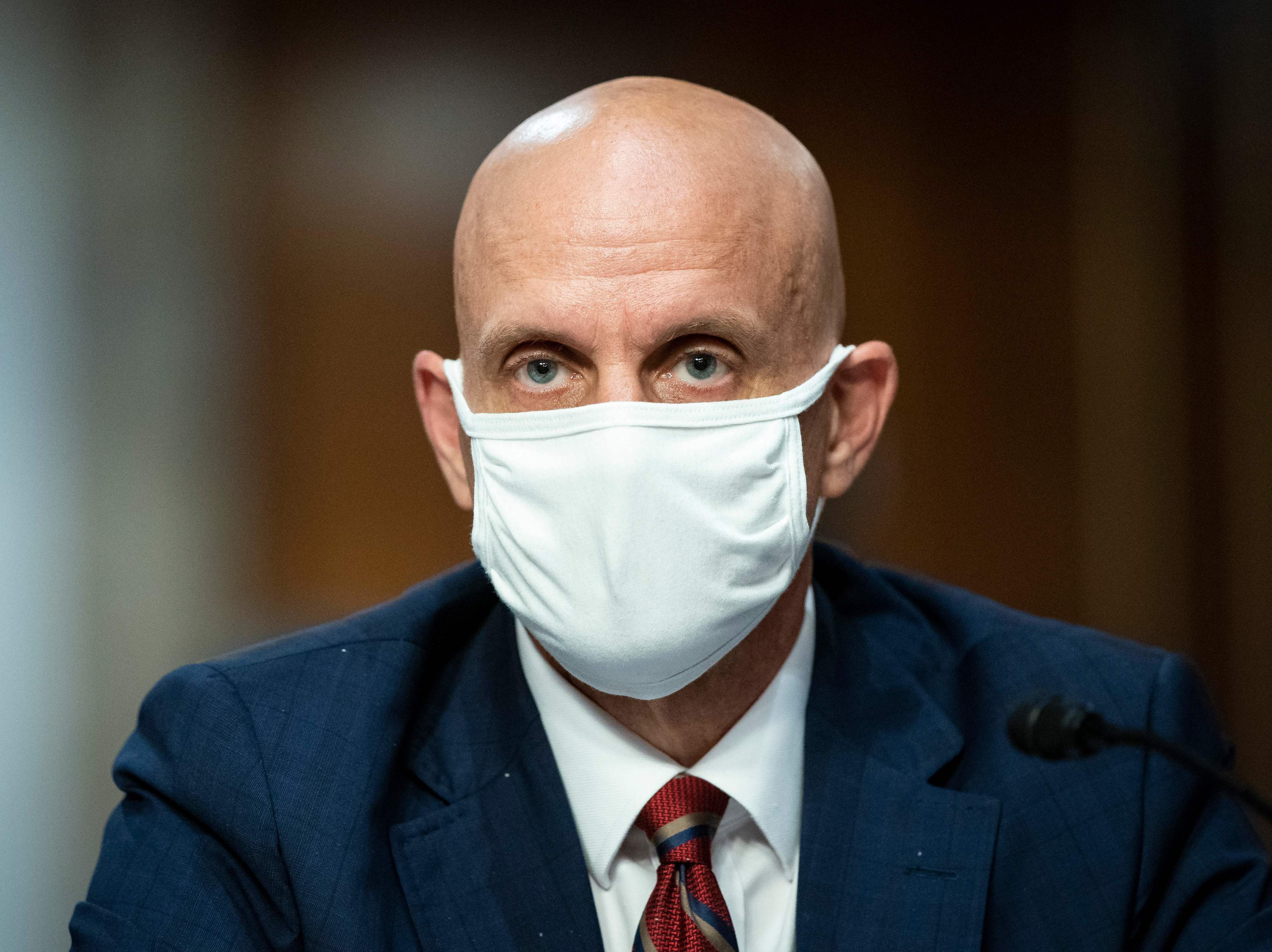 caption: Stephen Hahn, who heads the FDA, tells NPR the agency will likely make a decision about Pfizer's vaccine "shortly after" a meeting on Thursday.