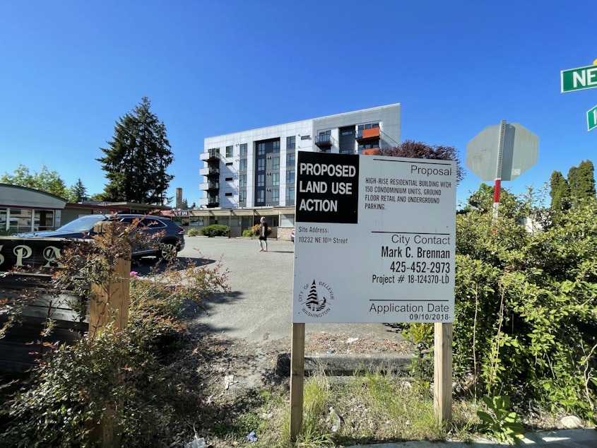 caption: Holly Yang helped facilitate the sale of this land to Chinese developer Create World, where it built Mira Flats (condominiums) phase 1, visible in the distance, and plans to build phase 2 soon on the property in the foreground. The property is just around the corner from one of Amazon's many properties in downtown Bellevue.