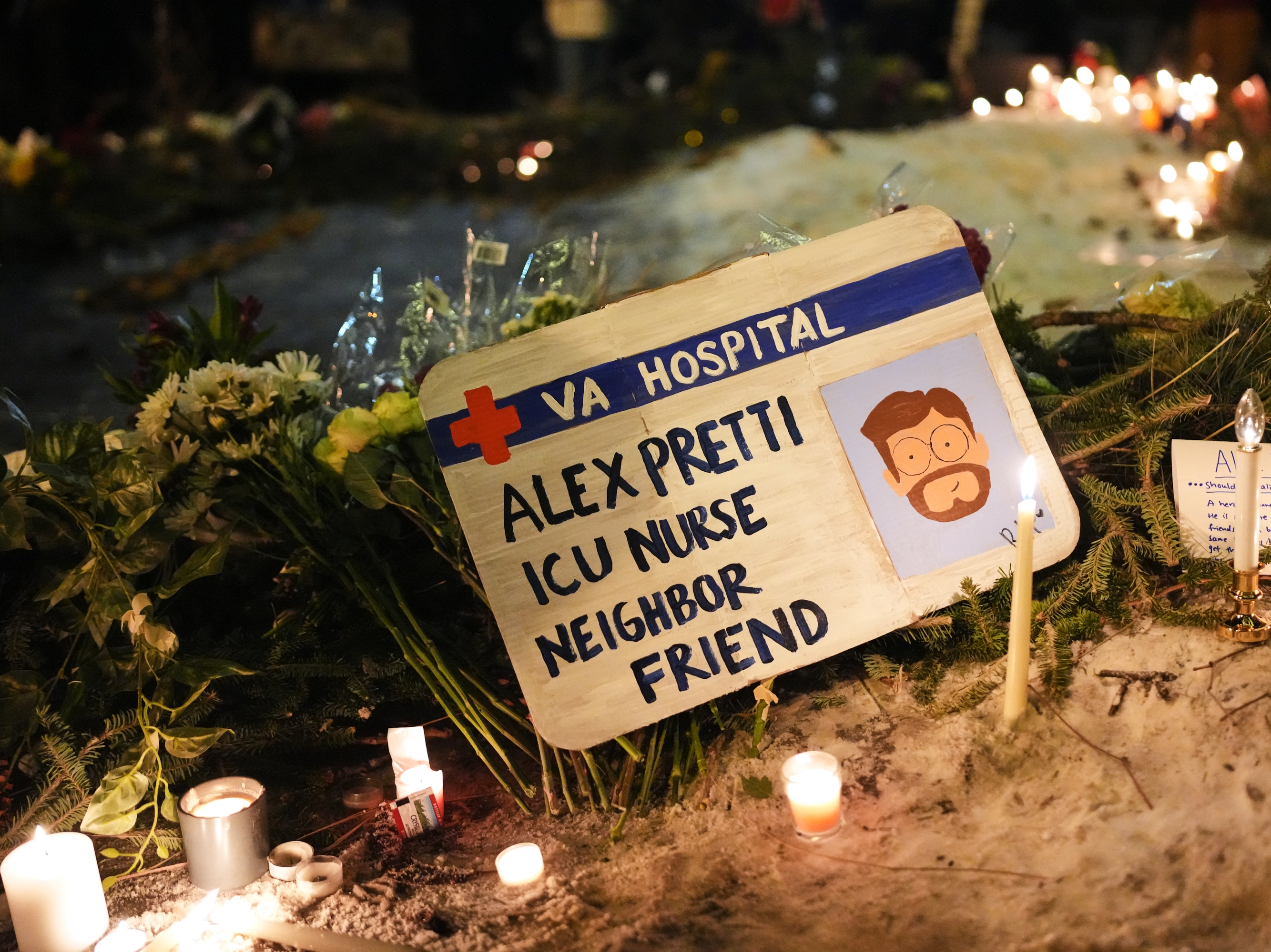 caption: A sign for 37-year-old Alex Pretti, who was fatally shot by a U.S. Border Patrol officer earlier in the day, is displayed during a vigil Saturday, Jan. 24, 2026, in Minneapolis.