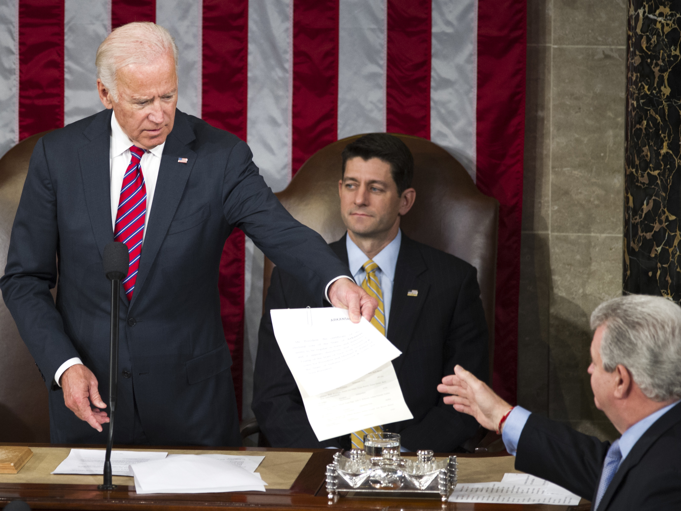 caption: Then-Vice President Joe Biden presides over a joint session of Congress in January 2017 to name Donald Trump formally as president-elect.