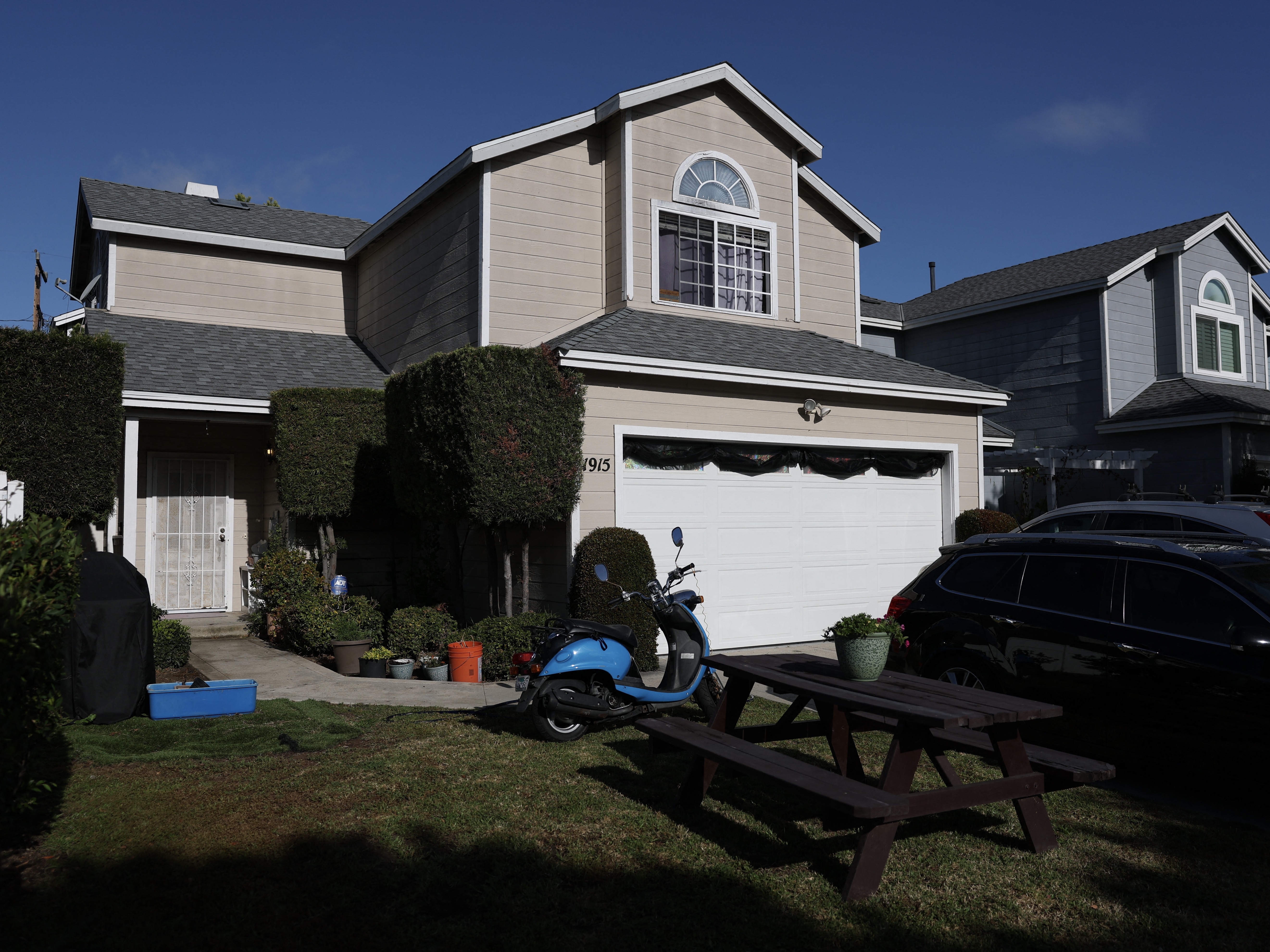 caption: A view of a home associated with the suspected White House Correspondents' Dinner shooter Cole Tomas Allen in Torrance, Calif., on Sunday.