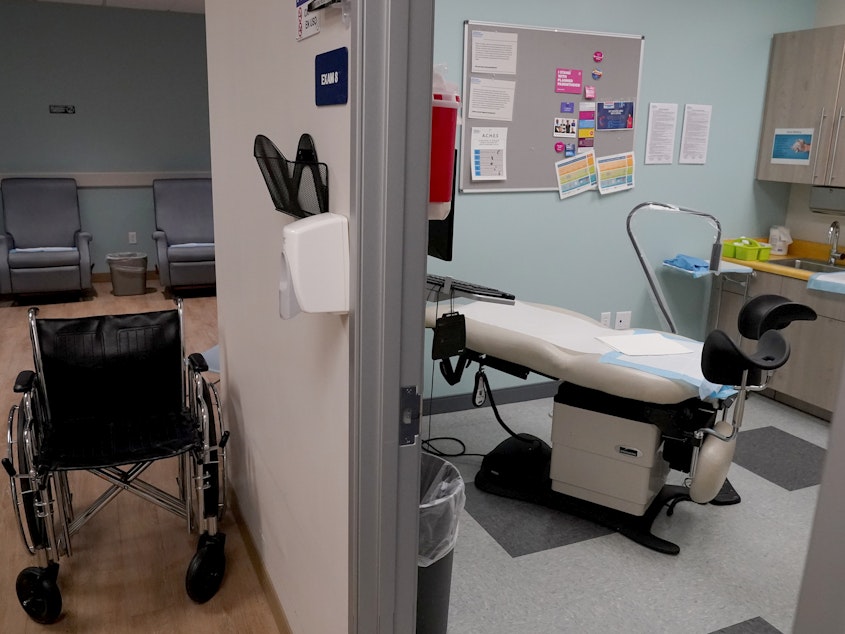 caption: An unoccupied recovery area, left, and an abortion procedure room are seen at a Planned Parenthood Arizona facility in Tempe, Ariz., on June 30, 2022. On Friday, Dec. 30, the Arizona Court of Appeals concluded that doctors who provide abortions can't be prosecuted under a pre-statehood law that criminalizes nearly all abortions.