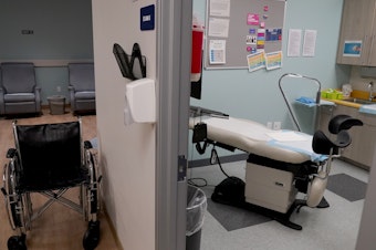 caption: An unoccupied recovery area, left, and an abortion procedure room are seen at a Planned Parenthood Arizona facility in Tempe, Ariz., on June 30, 2022. On Friday, Dec. 30, the Arizona Court of Appeals concluded that doctors who provide abortions can't be prosecuted under a pre-statehood law that criminalizes nearly all abortions.