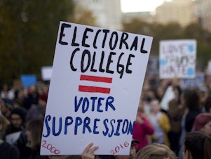 caption: Protesters demonstrate four years ago against Donald Trump, then the president-elect, outside Independence Hall in Philadelphia. Trump won the Electoral College but lost the popular vote by nearly 3 million votes.