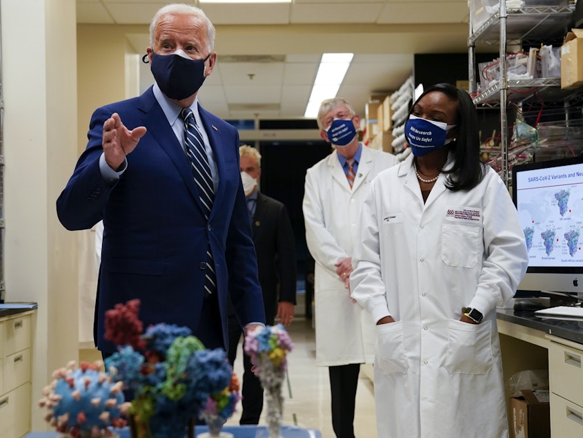 caption: During remarks at the National Institutes of Health, President Joe Biden said his administration has secured enough Covid-19 vaccines to ensure the nation is on track to vaccinate 300 million Americans by mid-July.