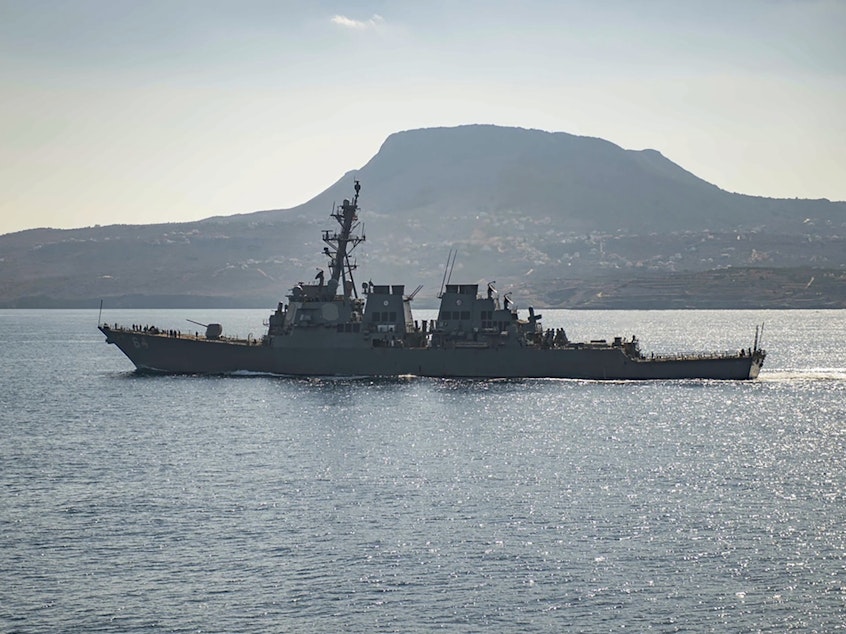 caption: The guided-missile destroyer USS Carney in Souda Bay, Greece. The U.S. military said the ship shot down drones launched from Houthi-controlled areas of Yemen on Saturday.
