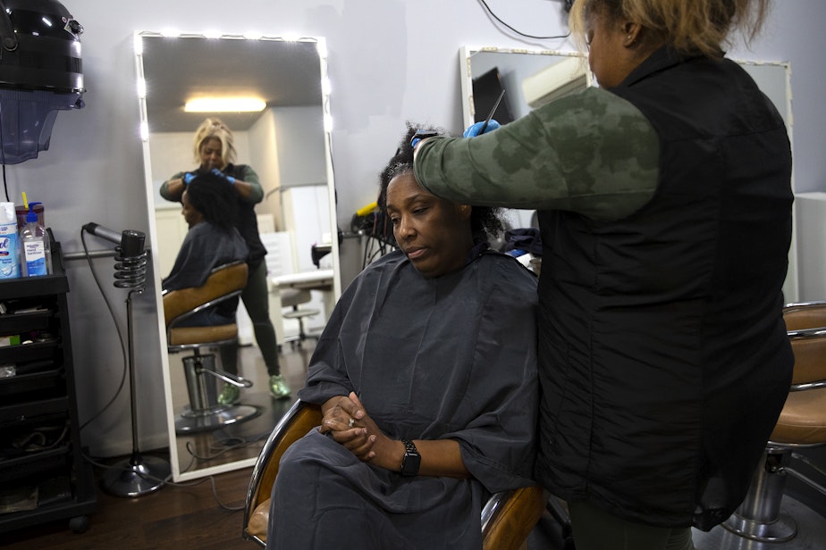 caption: DaVonna Johnson has her hair colored by Nina Trapp, right, at Mati’s Salon and Barbershop on Friday, May 24, 2024, along Rainier Avenue South in Seattle. 