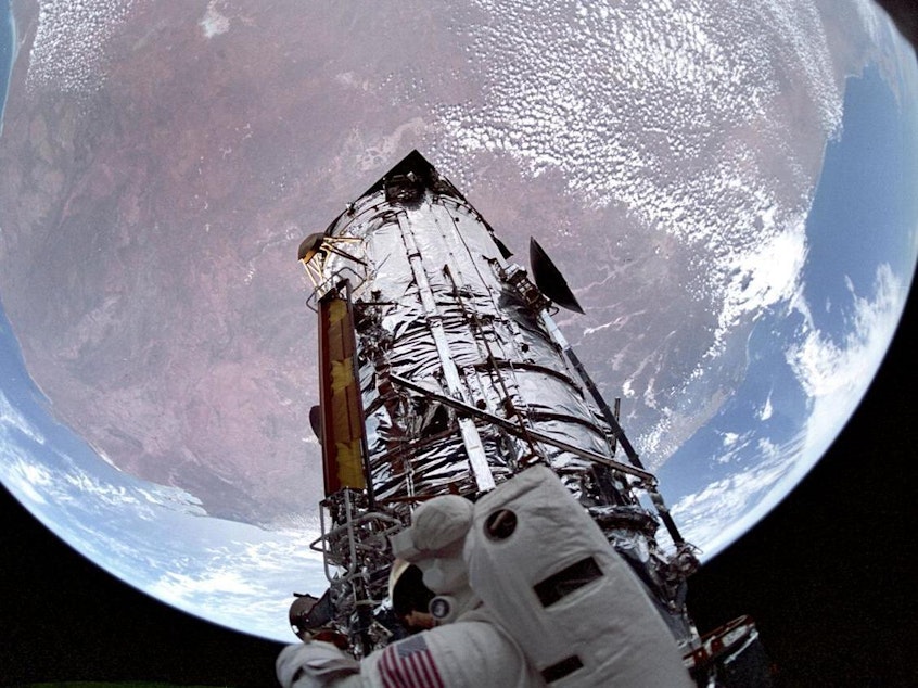 caption: Because space shuttle missions went up to repair and refurbish the Hubble Space Telescope, it has a relatively large carbon footprint compared to other telescopes.