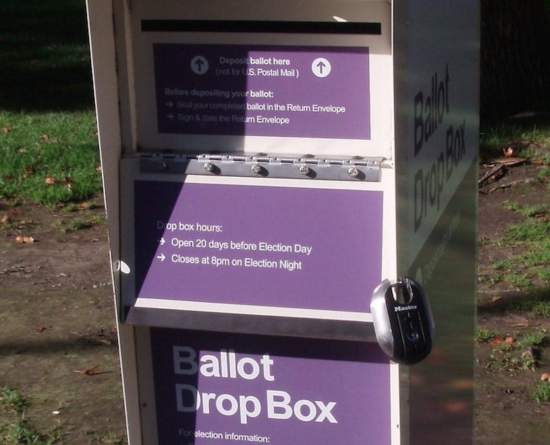caption: Washington election officials say they will work closely with the U.S. Postal Service to ensure ballots are delivered on time, but they're urging voters to use ballot drop boxes, especially closer to Election Day.