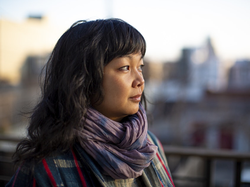 caption: Genevieve Villamora, 44, says she suffered hair loss after recovering from COVID-19: Her hands would be covered with hair after a shower. It was "traumatic because as a woman so much of my femininity and self-image is linked to my hair," says the Washington, D.C., restaurateur. Her hair loss began to lessen four months out from her recovery from COVID.