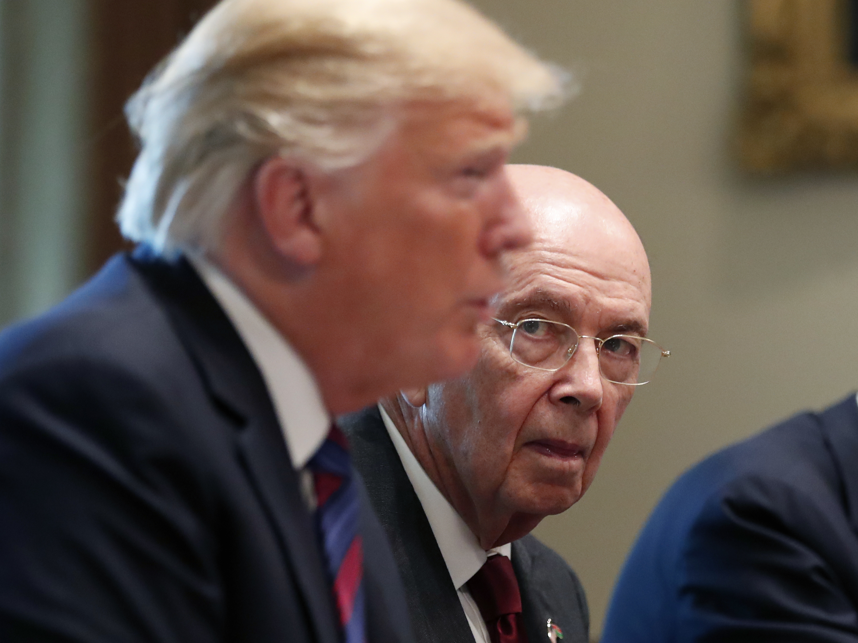 caption: The House oversight committee has released internal documents about the failed push for a census citizenship question by former President Donald Trump's administration, including Wilbur Ross, the former commerce secretary who is shown at a White House meeting in 2018.