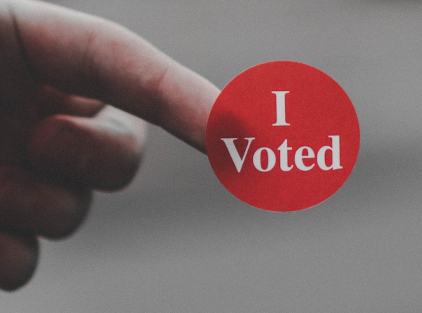 caption: Voting sticker
