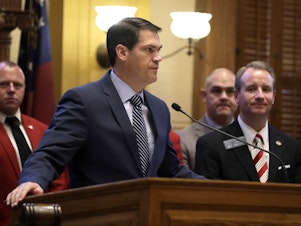 caption: Lt. Gov. Geoff Duncan speaks on the floor of the Georgia State Senate on Feb. 4.