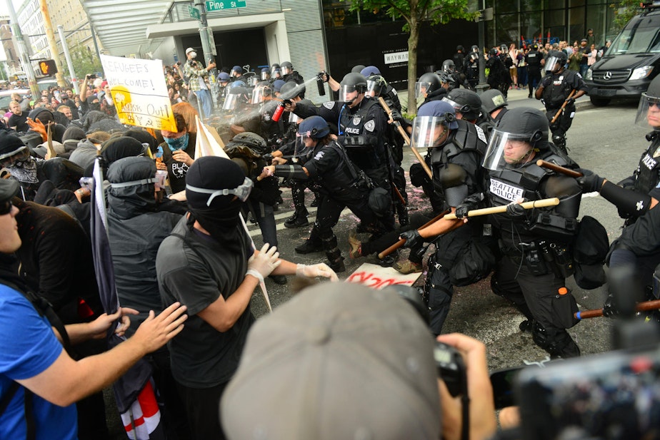 caption: Seattle Police clashed with anti-fascist marchers at 2nd Ave. and Pine St., Seattle, August 13, 2017.